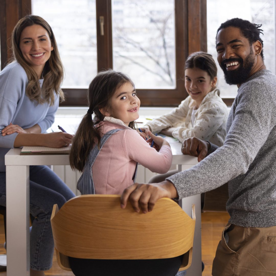 side-view-family-sitting-table
